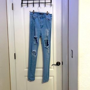 Fashion Nova blue ripped jeans